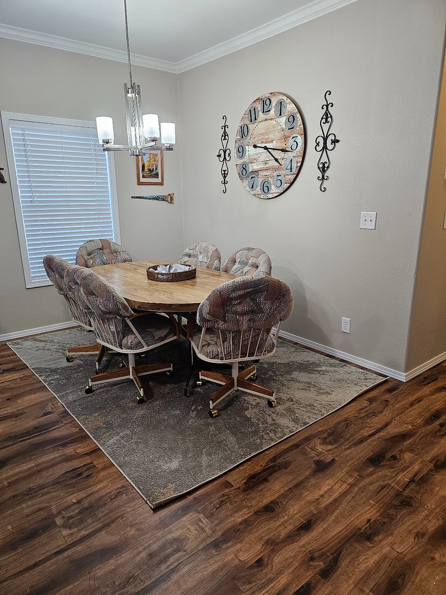 Main dining area conveniently located off the living room offering comfortable seating for shared meals and gatherings