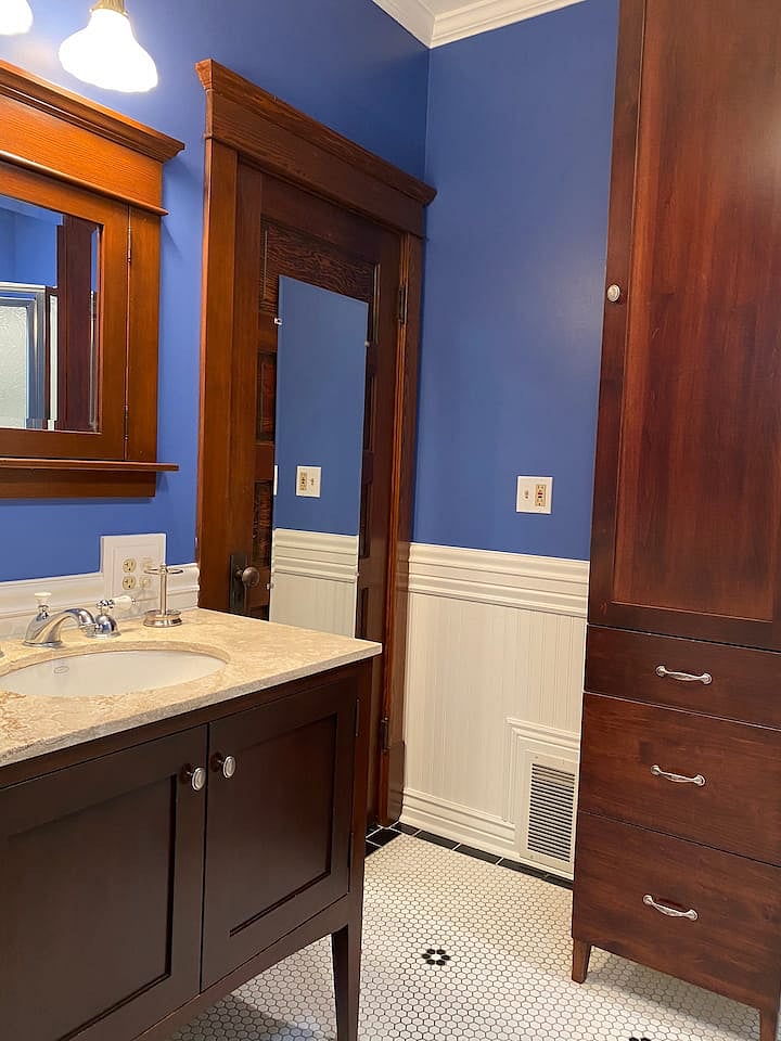 Main floor bathroom with clawfoot soaking tub & shower