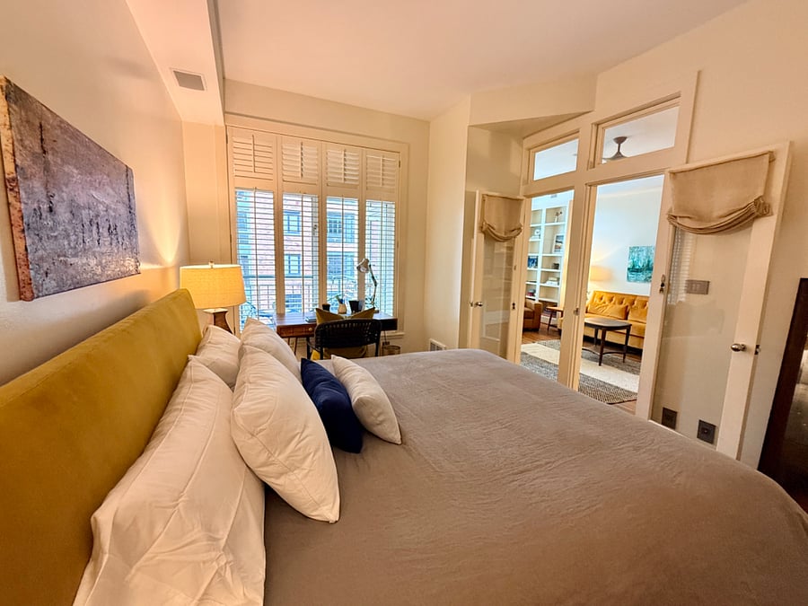 Brand-new luxury king DreamCloud Premium Hybrid mattress, upscale linens, privacy curtains on the French doors