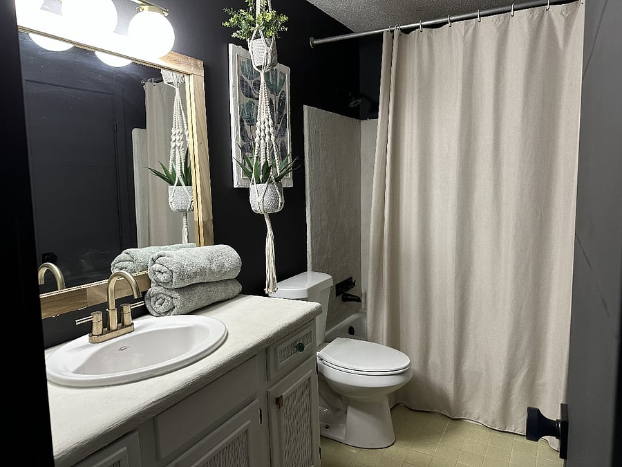 Upstairs bathroom access from hallway and from 2nd bedroom.