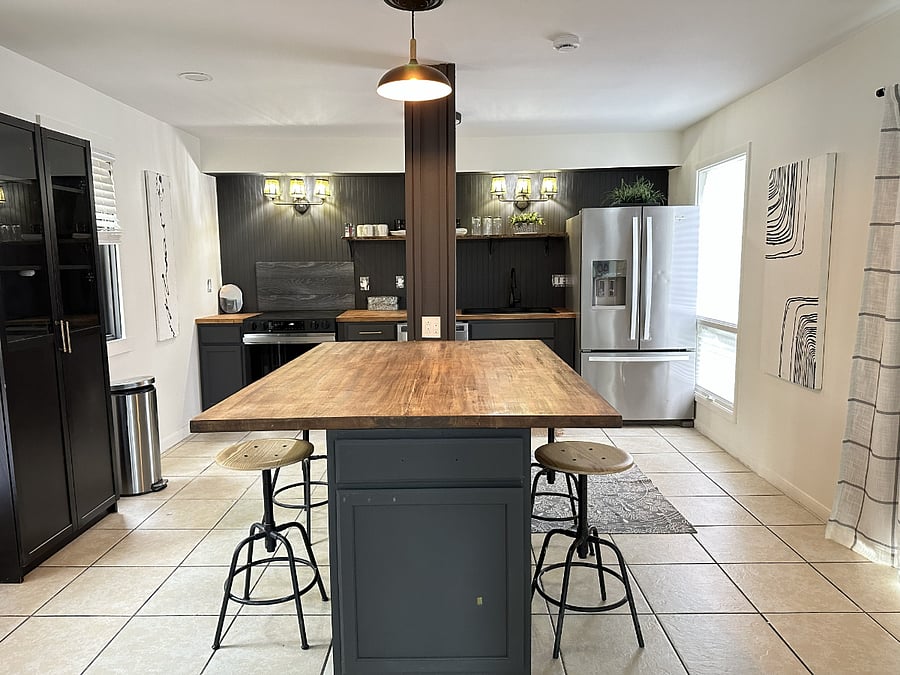 Open kitchen with sliding glass door access to the indoor courtyard.