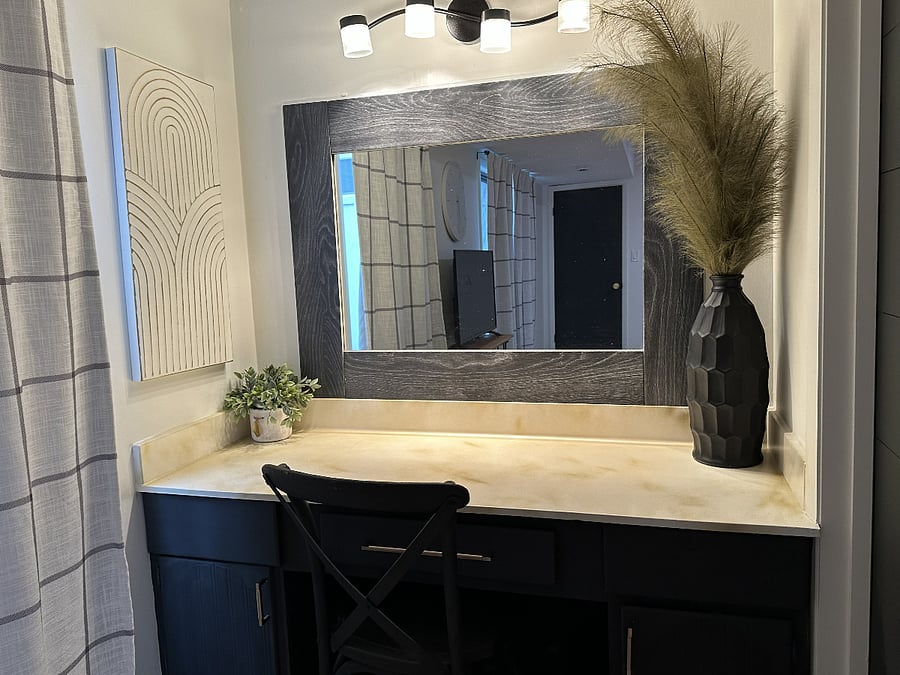 Dedicated work area or vanity in main floor bedroom
