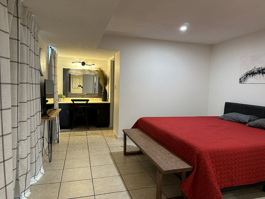 Main floor bedrom with dedicated work/vanity area