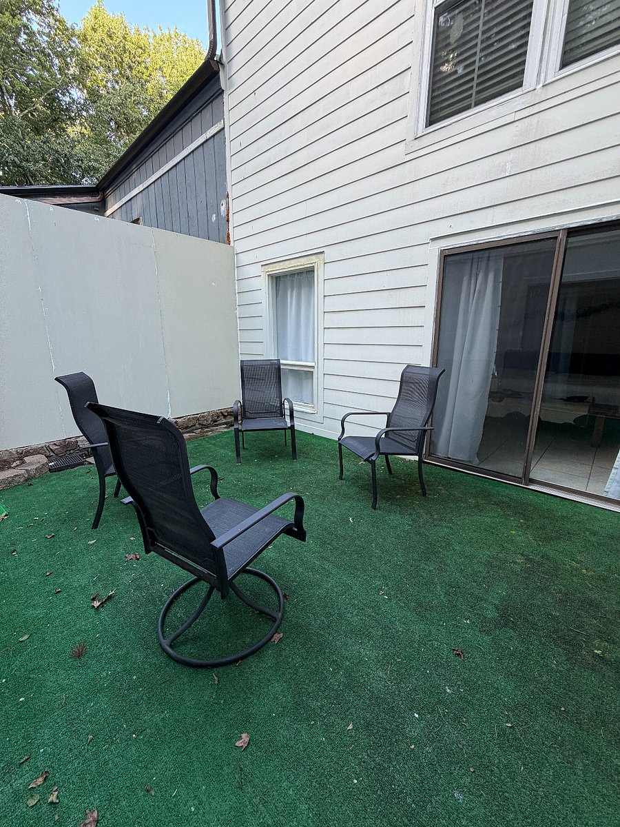 indoor courtyard accessible from the main floor bedroom on the right and the kitchen on the left