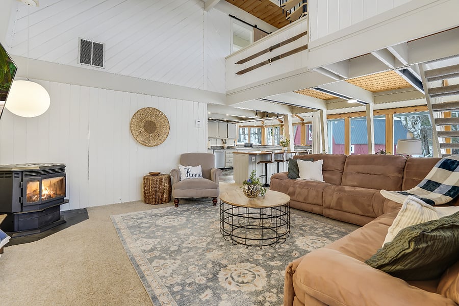 Open concept living space with pellet stove