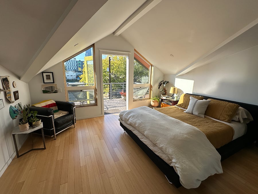 Primary bedroom & balcony