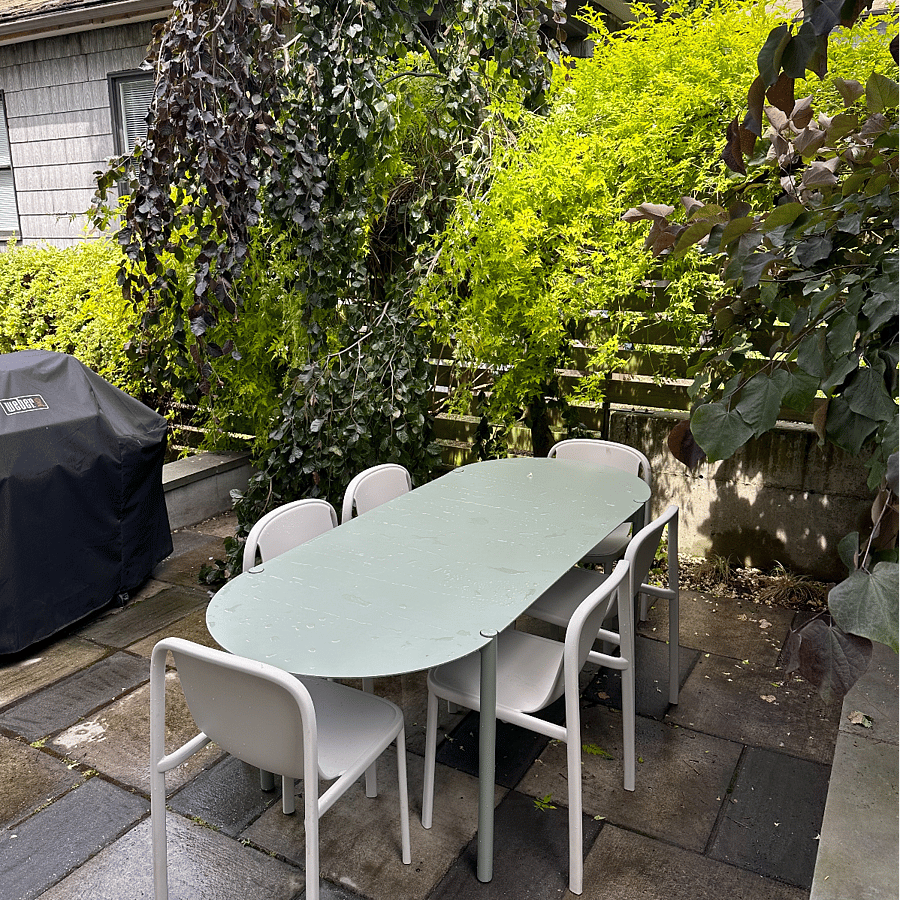 Lower patio outdoor dining furniture and grill