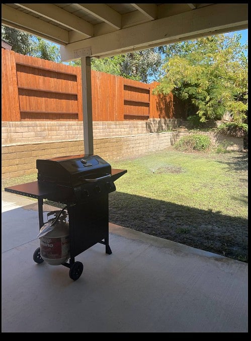Fully fenced backyard.
BBQ Grill