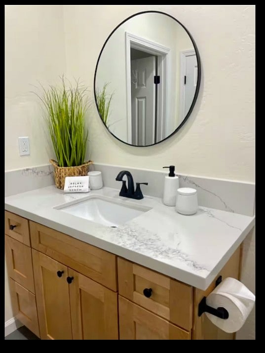 Green Haven Suite's Restroom
Enjoy a newly remodeled bathroom with a luxurious rainfall shower, hand-held shower hose, and a vanity offering ample storage for all your essentials.