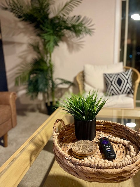 Enjoy one of two living rooms, featuring comfortable seating and a big-screen Roku TV for streaming, movies, or just unwinding after a long day.