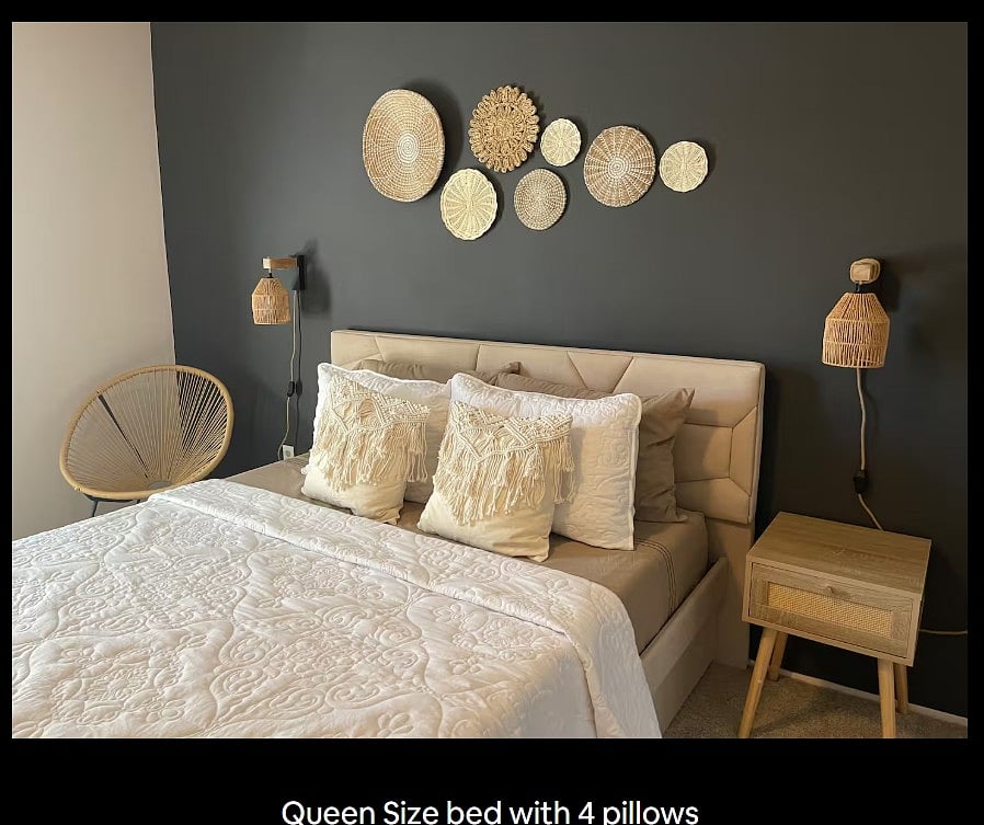 Enjoy the Bohemian Room, a vibrant, cozy space featuring its own bathroom, walk-in closet, smart TV, ceiling fan, study desk, and blackout curtains. Perfect for lounging, reading, or streaming in comfort, with a relaxed bohemian vibe that feels like home.