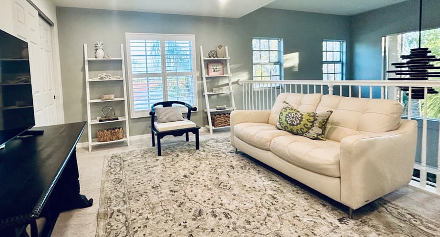 Versatile upstairs loft perfect as a second living space or kids lounge