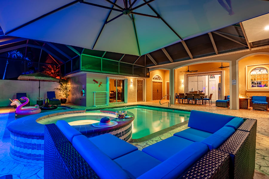 Private courtyard, pool, hot tub area with LED lighting