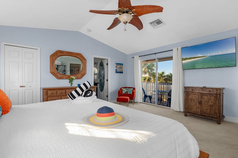 Tropical Room View. Balcony for sunset viewing and also offers a view of the court yard.