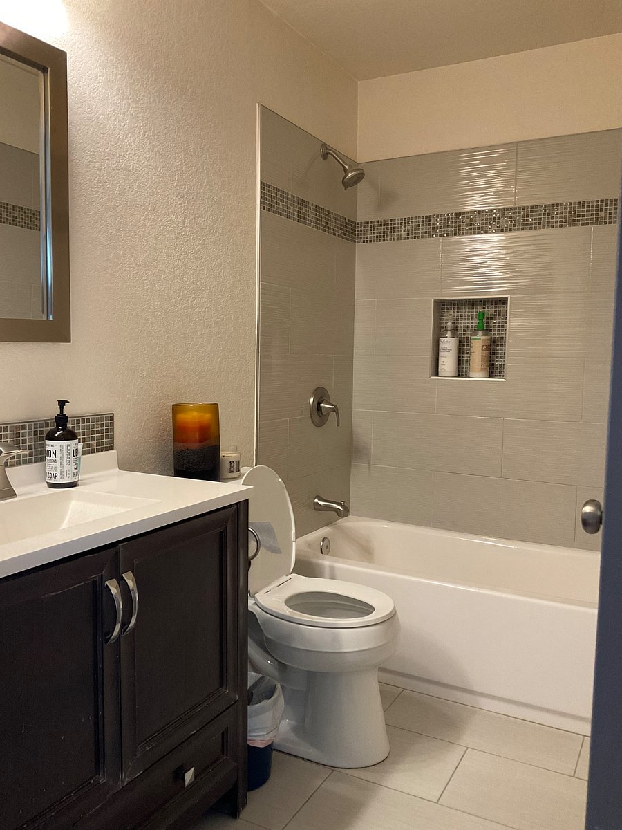 Shared bathroom for bedroom with full size bed