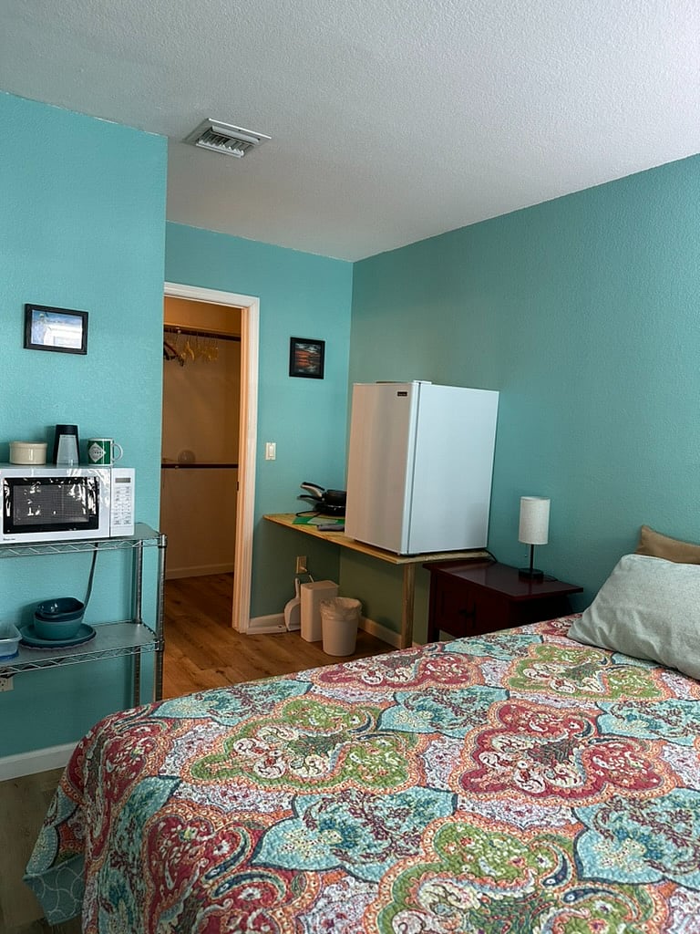 Bedroom 1 covered patio and private entrance. Shown with optional kitchenette.