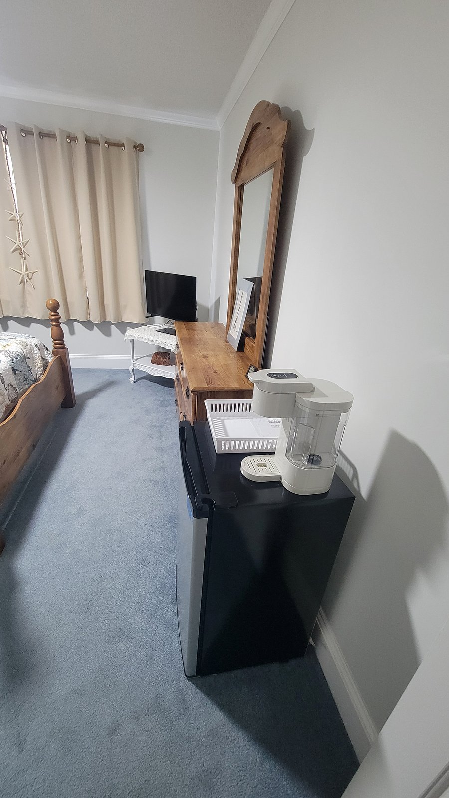 Bedroom Number 1, Nautical. Dorm Fridge with freezer & Keurig coffee maker.