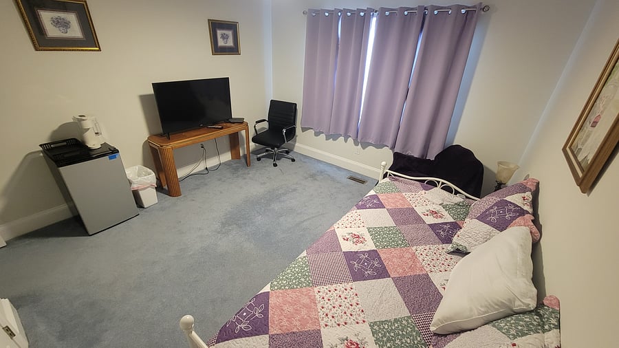 Bedroom #2 The Purple Room. Includes a day bed and trundle 