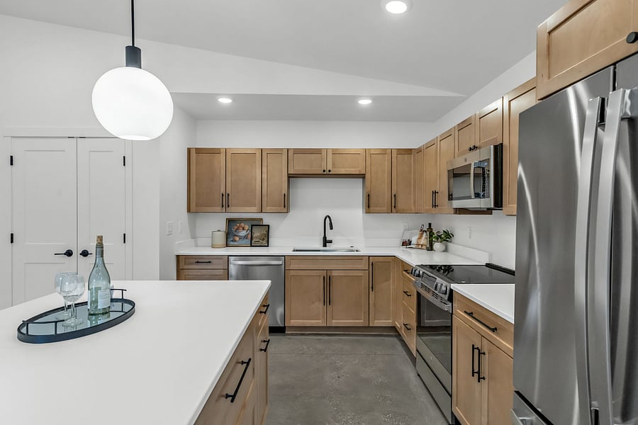 Large kitchen and island with seating.