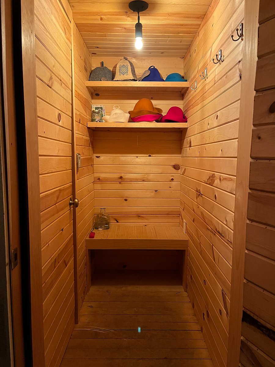 Sauna anti-chamber and traditional Ukranian wool sauna hats.