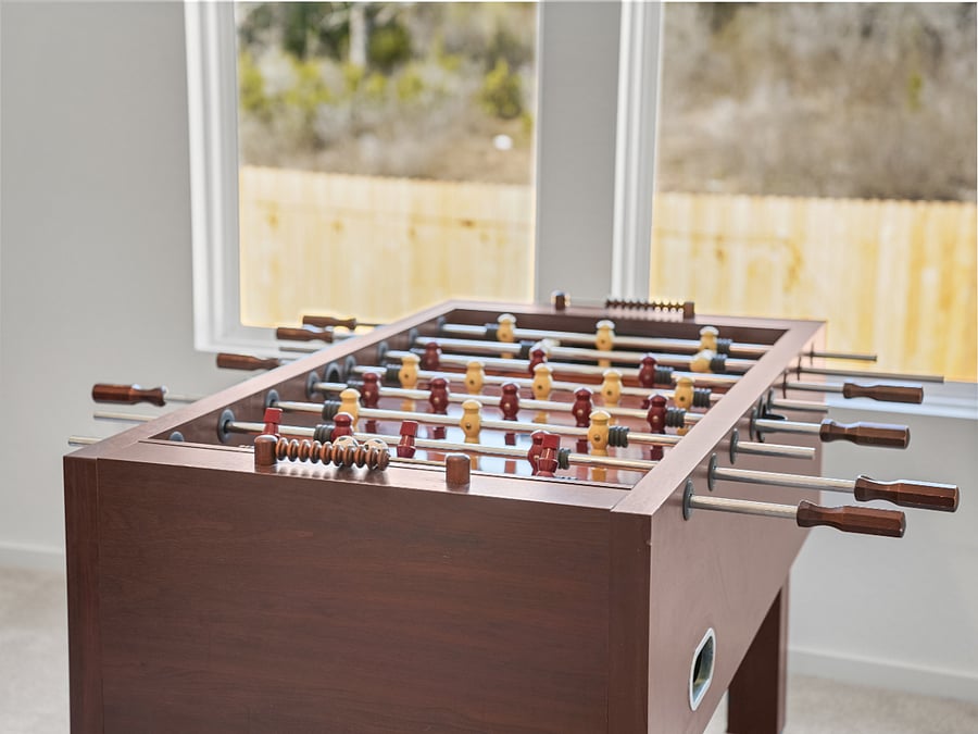 Up close and ready for action  the foosball table is perfect for a friendly game and a little competitive fun!