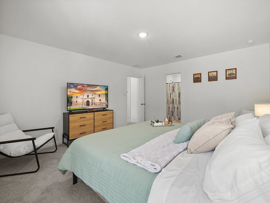 Spacious and thoughtfully designed, the Primary Suite features a king bed, Smart TV, walk-in closet, and private ensuite  creating a true retreat within the home.
