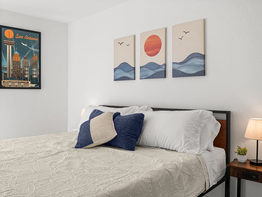 With vibrant oranges and blues inspired by the San Antonio skyline as seen from the Tower of the Americas, this king bedroom brings energy, color, and comfort into a beautifully designed retreat.