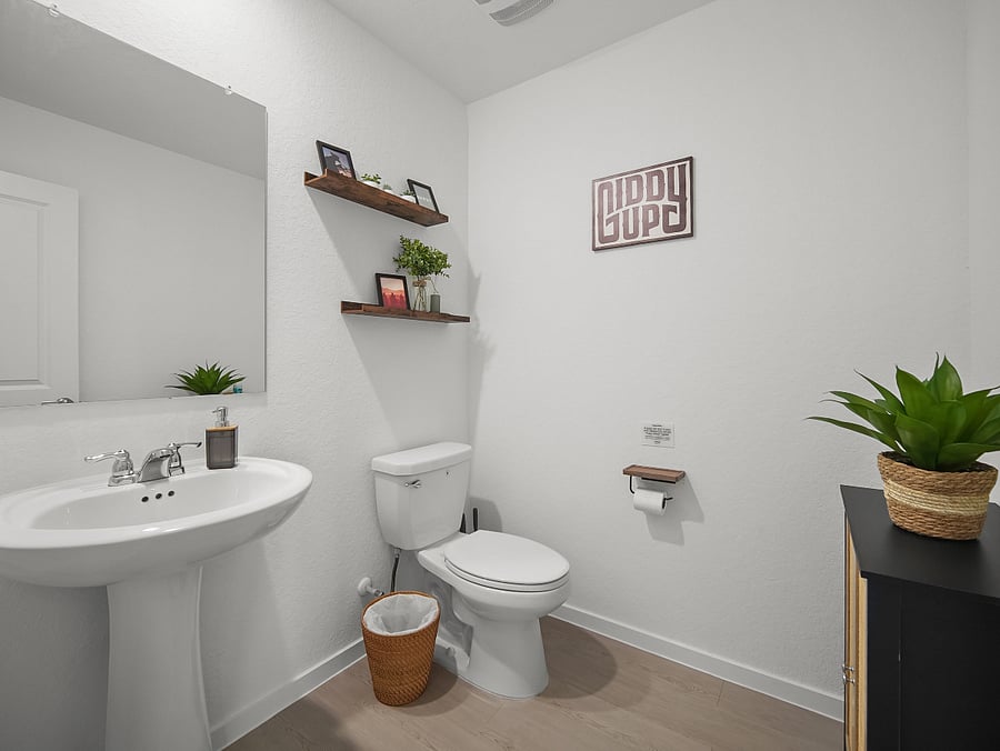 Convenience of a downstairs bathroom, continuing the Western theme-meets Mid-Century vibe of the home. 