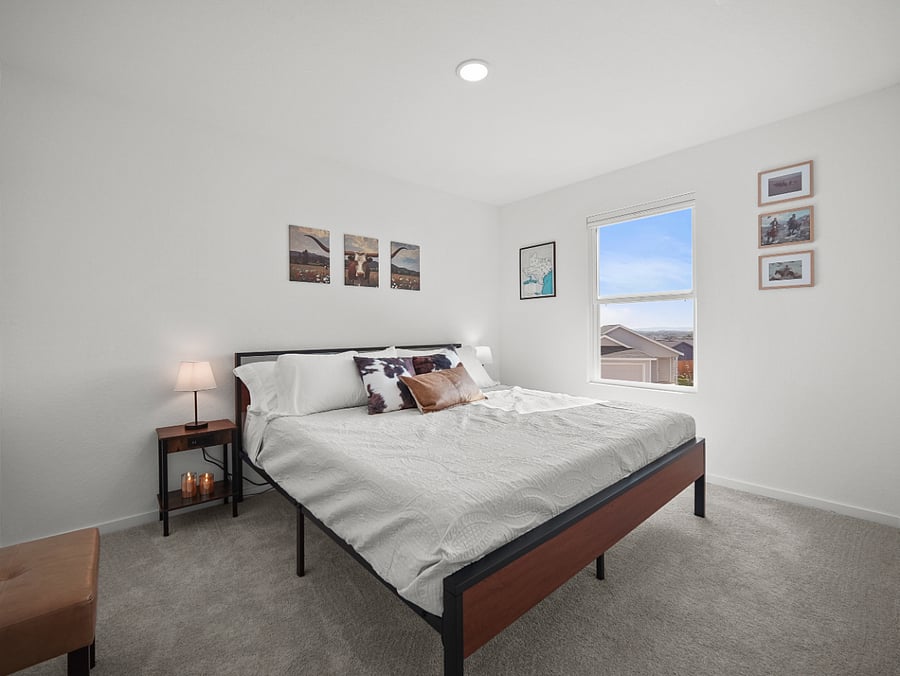 Western-inspired touches meet generous space in this king bedroom  a comfortable retreat with room to breathe and relax.