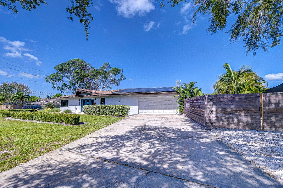 Driveway & RV/Boat Parking (behind fence enclosure)