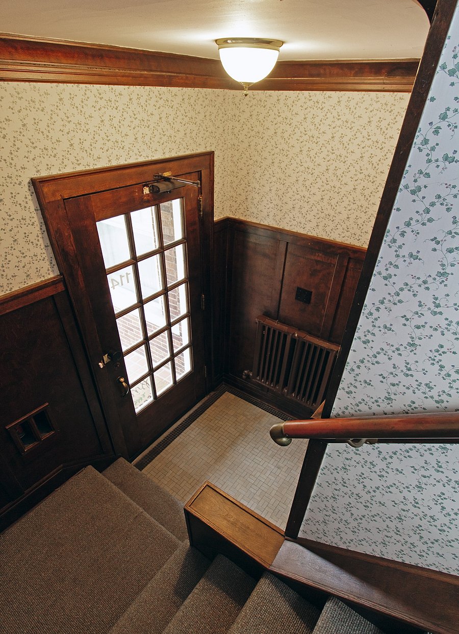 Interior stair to front entry.