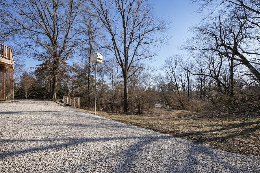 Private drive, forested views