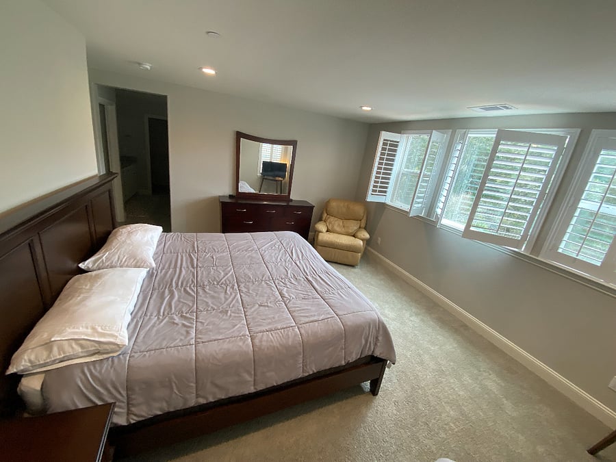 Primary bedroom with King Bed. All three bedrooms and laundry room are on the second floor.