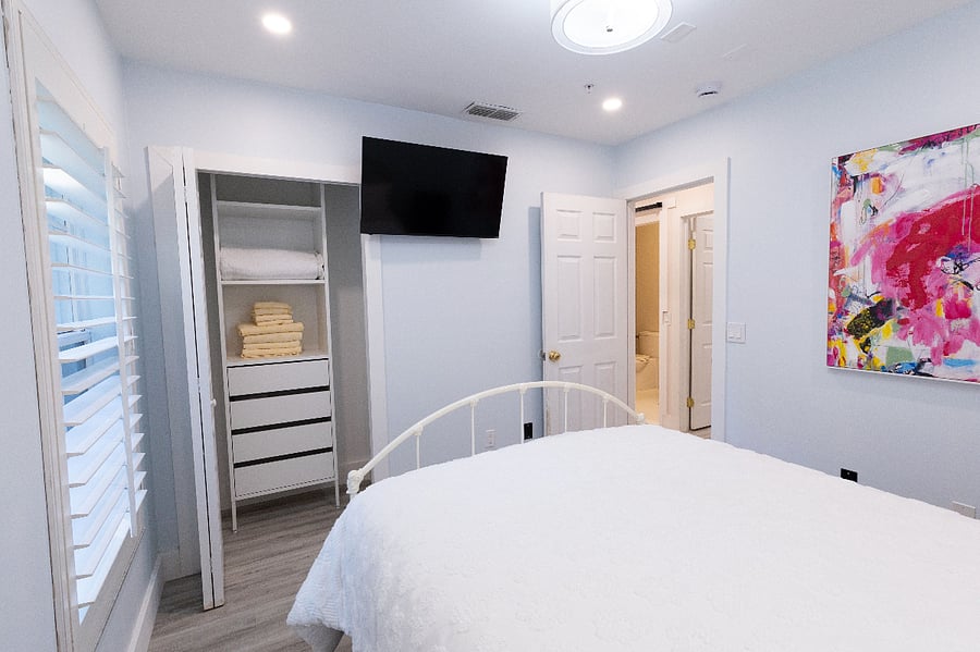 Bedroom - Queen Bed - Closet and TV (1)