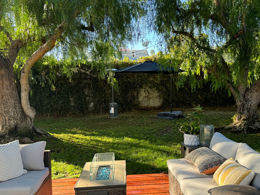 Beautiful Shade Peppercorn trees patio umbrella, fire table Heated tower BBQ
