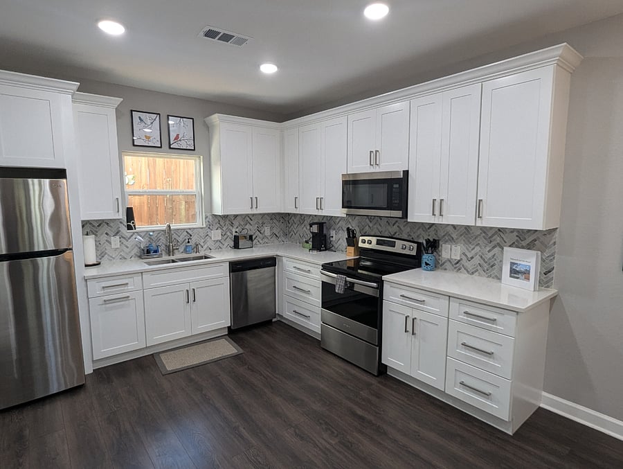 The open concept kitchen allows the chef to interact with guests.