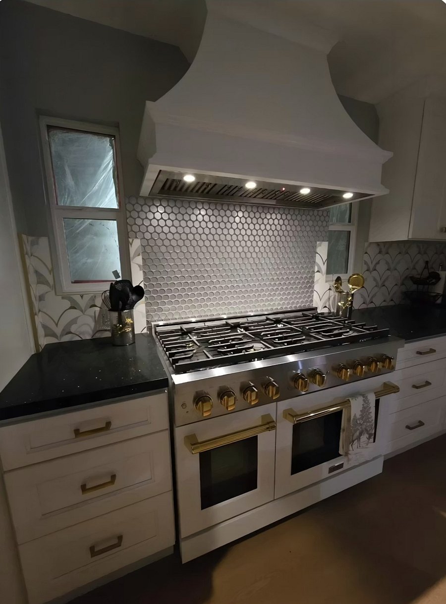 Gourmet kitchen with 48 professional-style gas range.