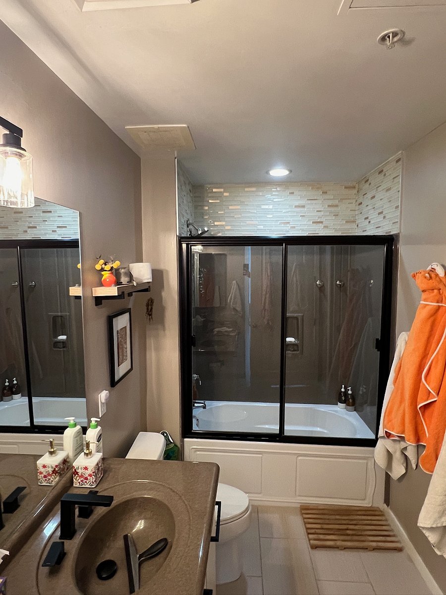 Primary bedroom bathroom (includes bathtub and entry to walk-in closet)