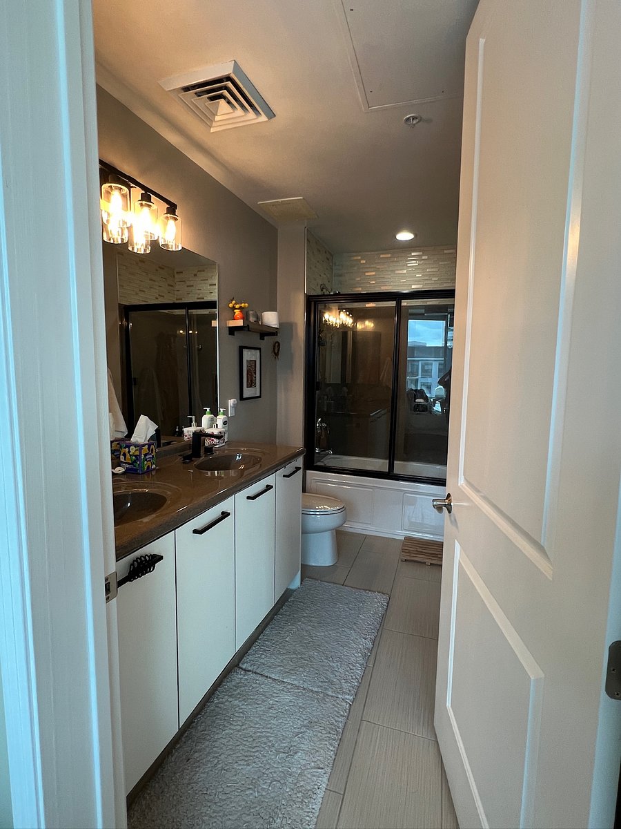 Primary bedroom bathroom (includes bathtub and entry to walk-in closet)