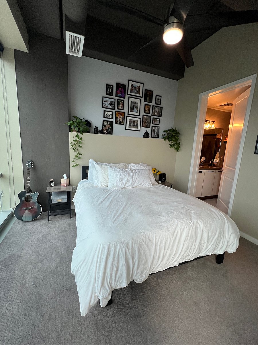 Primary bedroom (mirror, bed, nightstands included in rental. Personal decor and plants will be removed for renter)