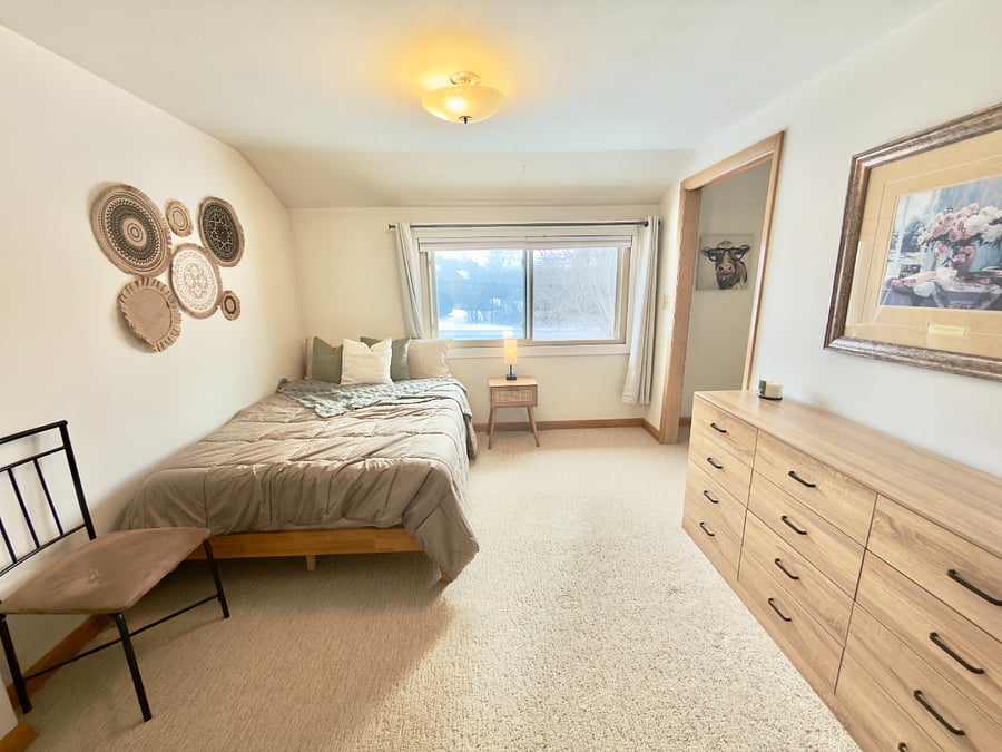 3rd bedroom on upper level full size bed with mattress topper. Has plenty of closet/drawers space and make-up vanity.