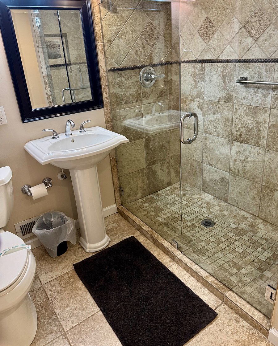 Newly renovated bathroom with a roomy shower