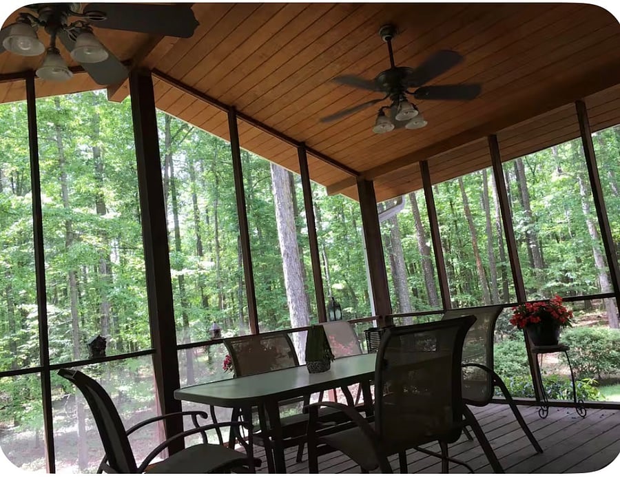 The gorgeous shared porch with a grill for your use and tables with chairs, a cooler amd a lounger. Always available to the tenant. A great place to enjoy you drink if choice and enjoy nature
