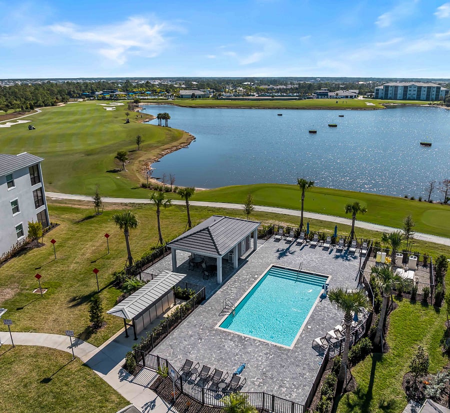 Satellite heated pool by building