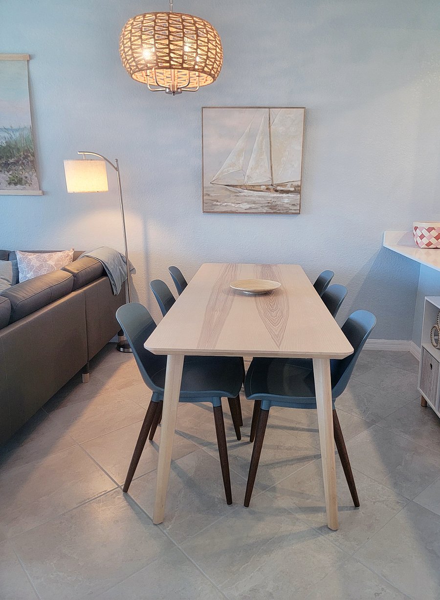 Dining area seats up to 8 (2 other chairs in bedrooms)