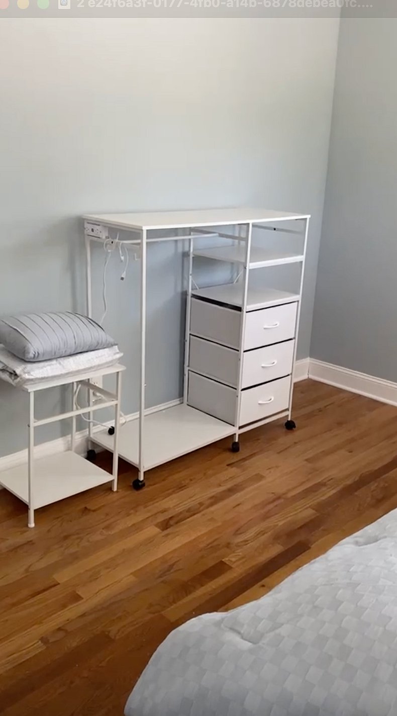 Hanging rack and drawers for clothes.