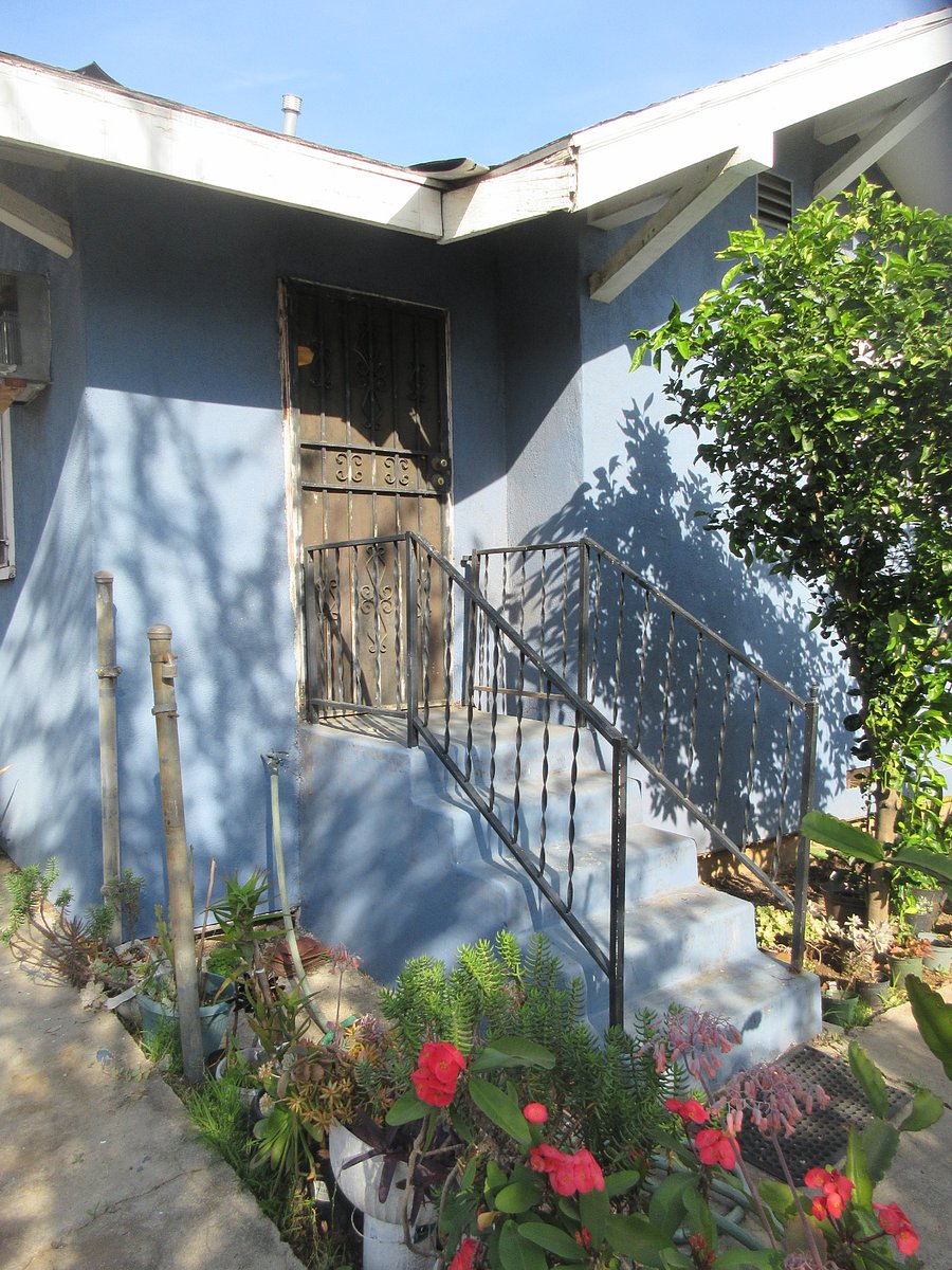 Exterior private entrance to bedroom. (Not pictured is main entrance to house, which is elsewhere).