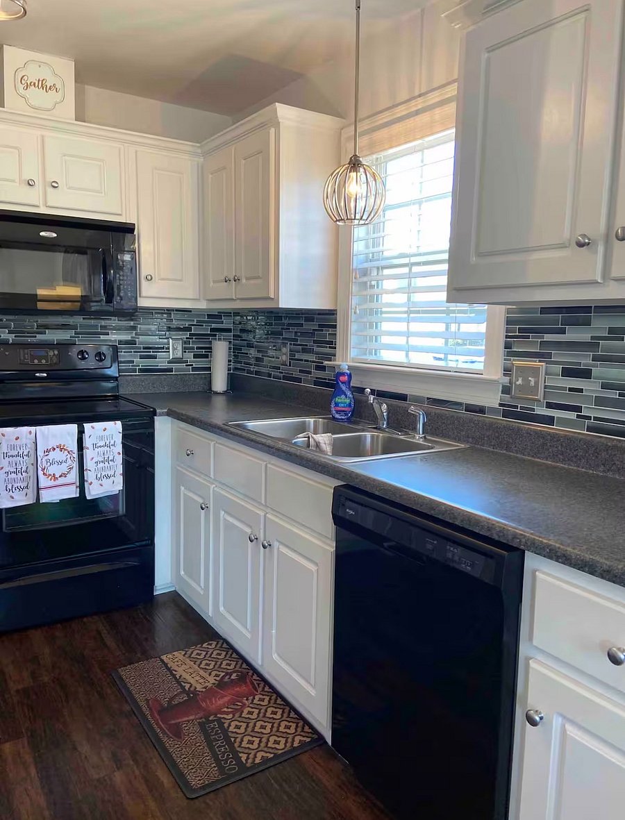 Kitchen view, stove, sink counter& dishwasher