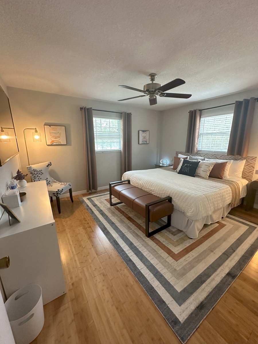 Bedroom 2: King Bed, double closet, 55" TV, blackout curtains.