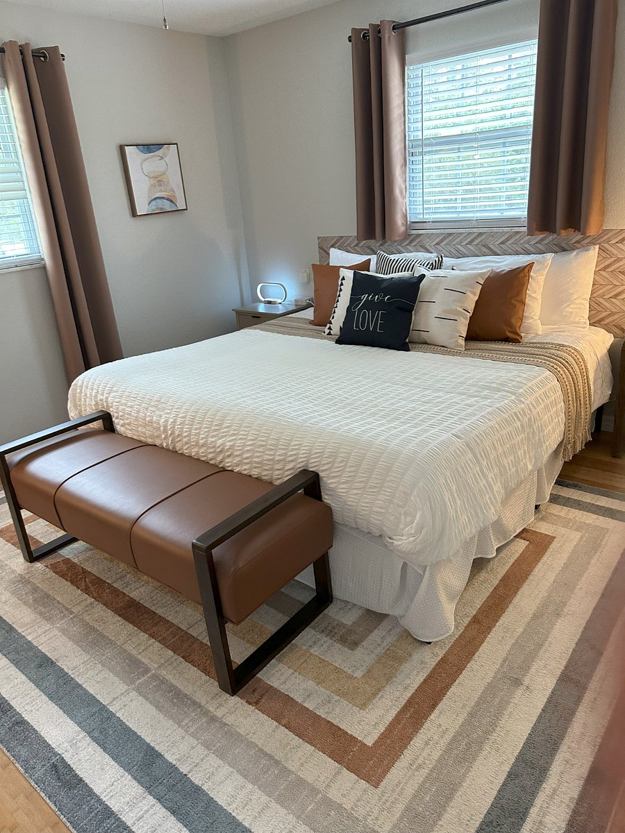 Bedroom 2: King Bed, double closet, 55" TV, blackout curtains.
